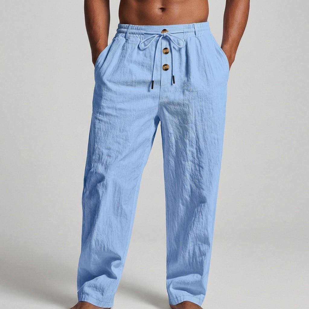 Light blue linen wide leg pants with a relaxed, bohemian style. 3