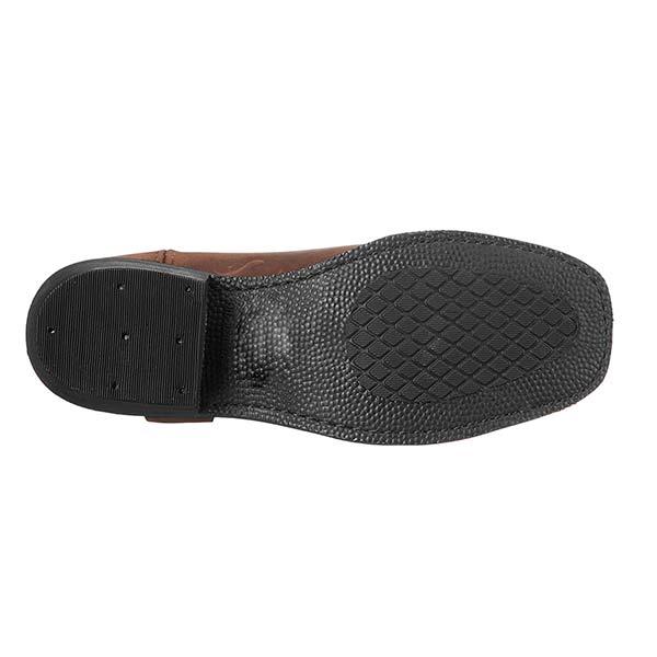 Men's harness boot with a strap and ring detail and a square toe.