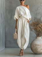 Livy | Off-white Off-shoulder Loose Casual Top And Tapered Pants Set