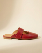 Tan chunky heel mules with a modern, minimalist design, perfect for casual or dressy occasions. 0