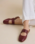 Tan chunky heel mules with a modern, minimalist design, perfect for casual or dressy occasions. 5