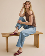 Tan chunky heel mules with a modern, minimalist design, perfect for casual or dressy occasions. 6
