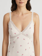 Écru floral lace v-neck dress neckline close-up
