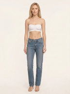 White seamless bandeau bralette with criss cross side closure