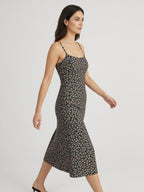 Black floral midi dress walking