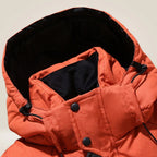 Blake All-Weather Down Jacket orange, close-up of the collar and snap placket