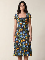 Black floral tulip print midi dress with square neckline, front view
