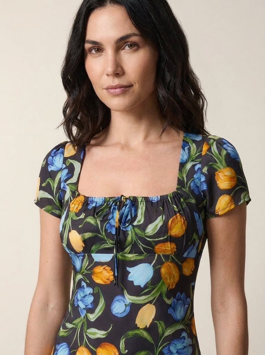 Black floral tulip print midi dress, close-up of square neckline and drawstring