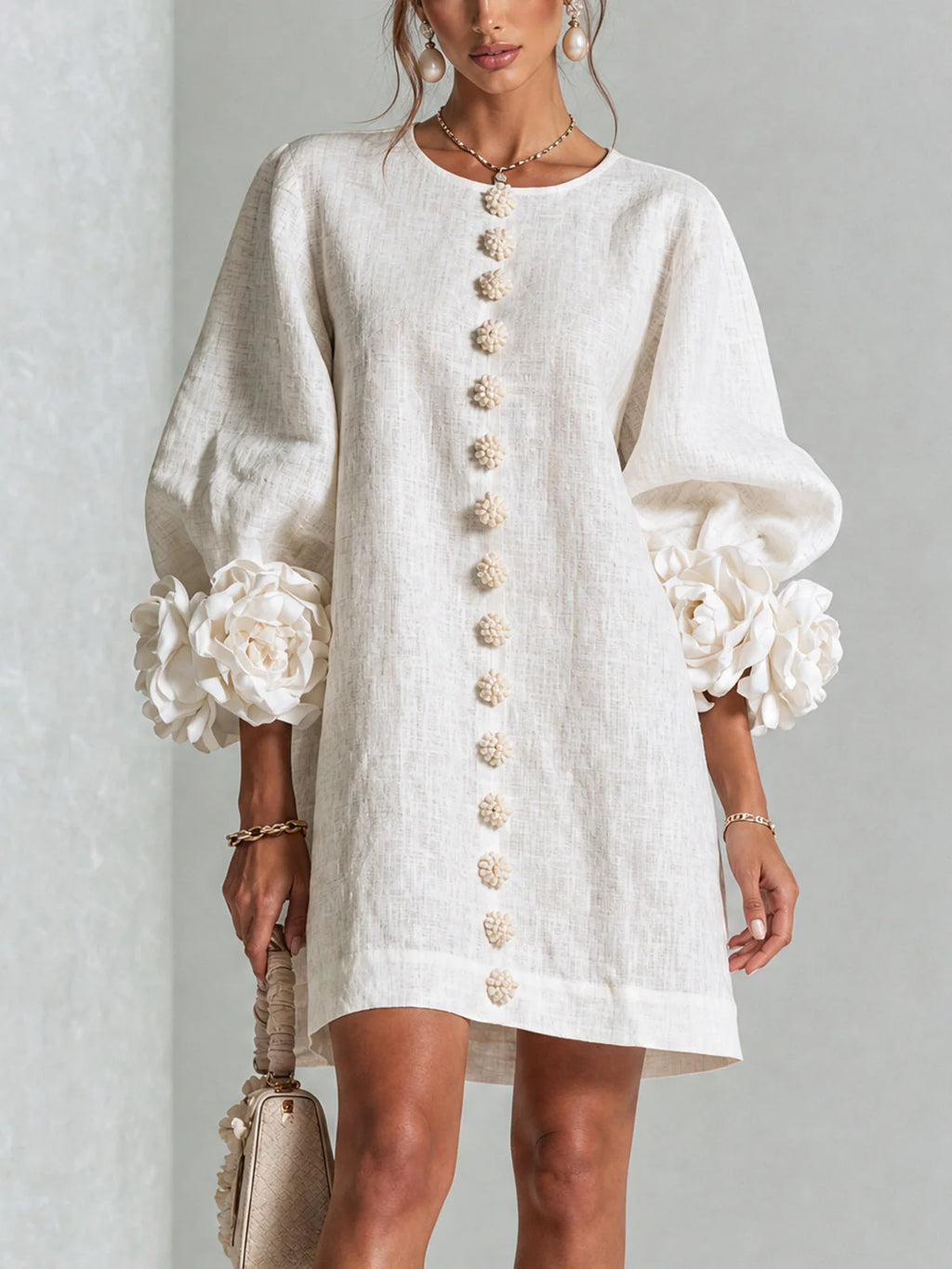 Clementine shift dress with balloon sleeves and rosette cuffs