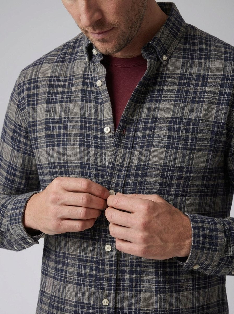 Grey navy check flannel shirt, close-up of buttons and collar