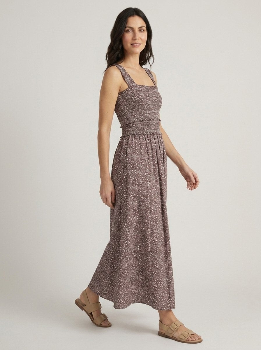 Chocolate ditsy floral smocked maxi dress, walking three-quarter view