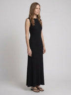 Black ribbed knit maxi dress, full body side view