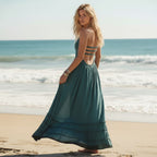 Bohemian maxi dress in a vibrant print, featuring a backless halter style in a cotton-rayon blend. 0