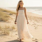 Bohemian maxi dress in a vibrant print, featuring a backless halter style in a cotton-rayon blend. 2