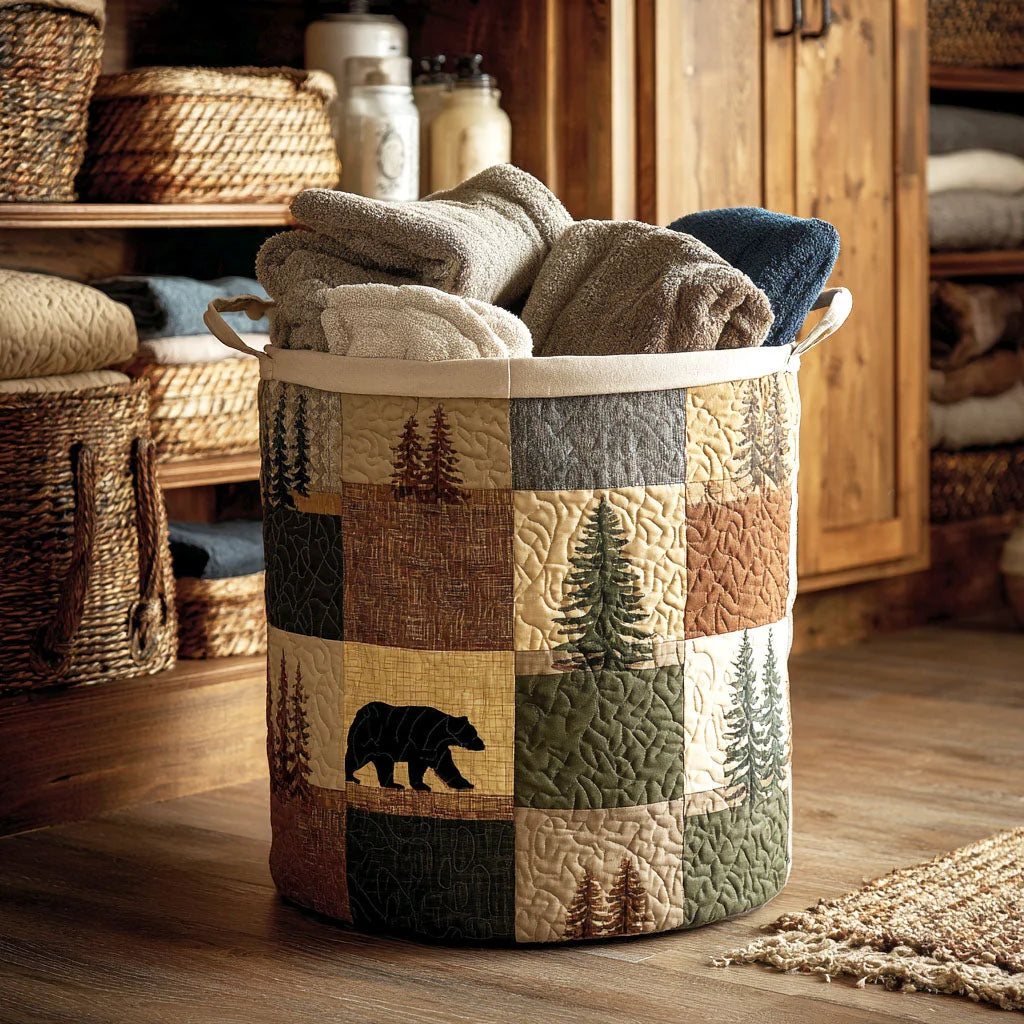 Neeltje quilted patchwork laundry basket in earth tones with pine tree and bear motifs