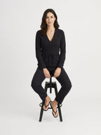 Noor black blouse, seated pose
