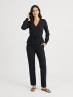 Noor black blouse, turn pose