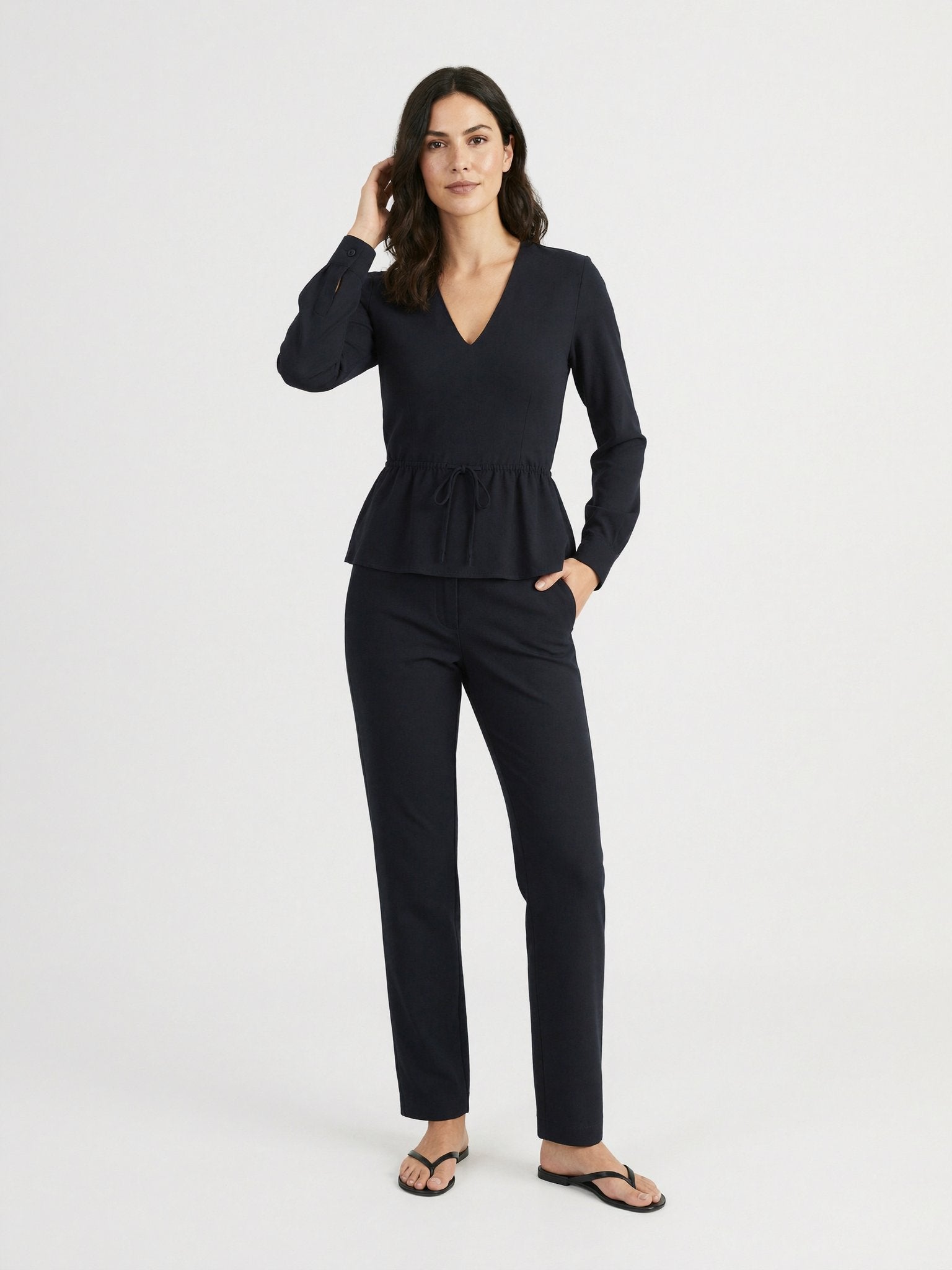 Noor black blouse, turn pose