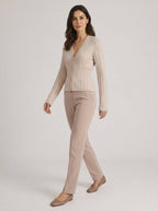 Rory ivory nipped waist V-neck knit cardigan, front view, walking