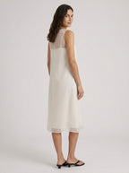 Sian ivory organza A-line midi dress, front view, matching black flat sandals