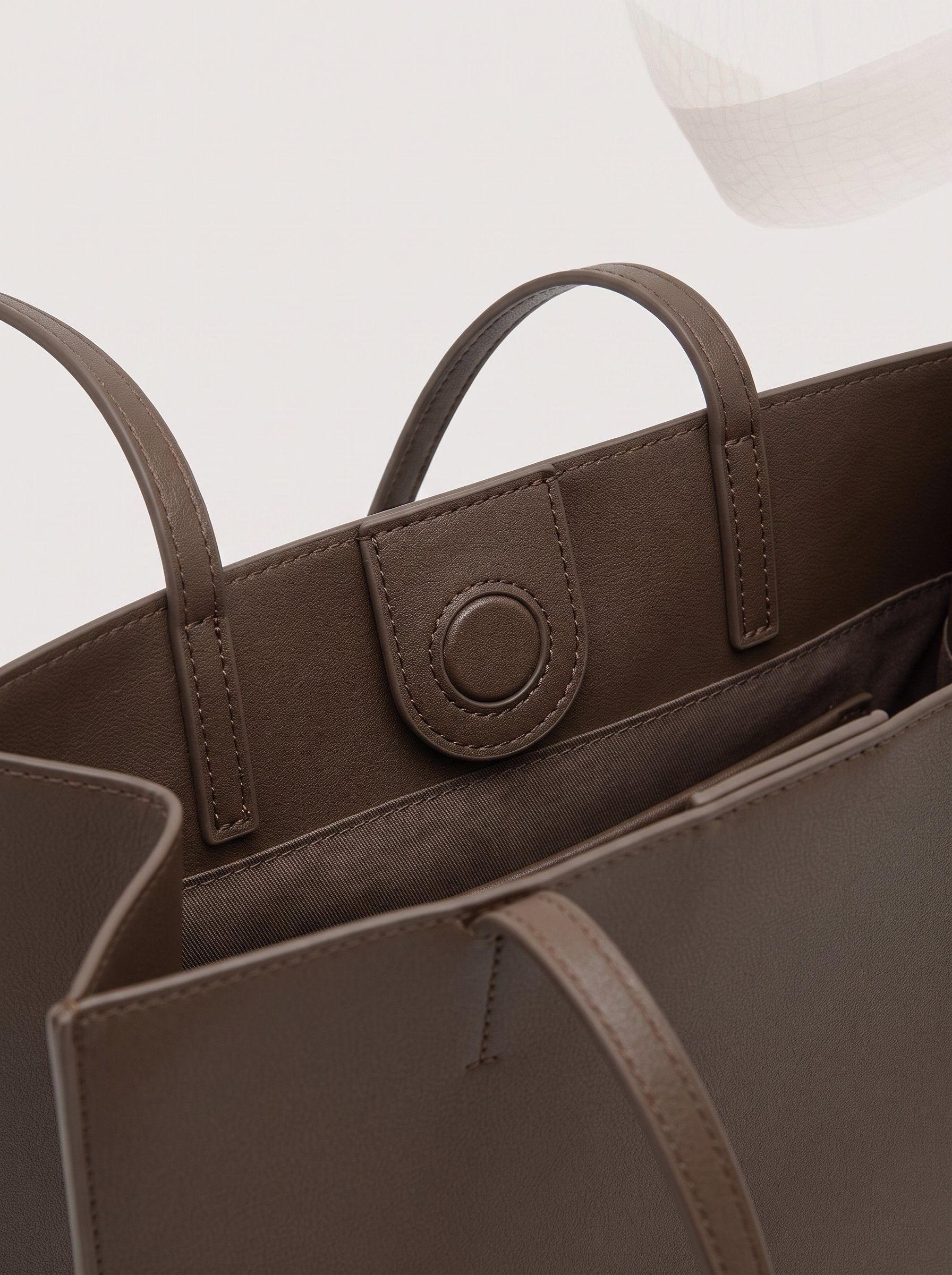Thea walnut shoulder bag strap and closure detail
